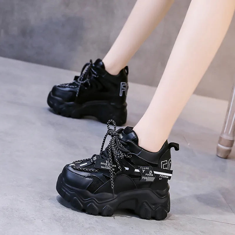 White women's platform tennis shoes with mesh upper and cross strap design