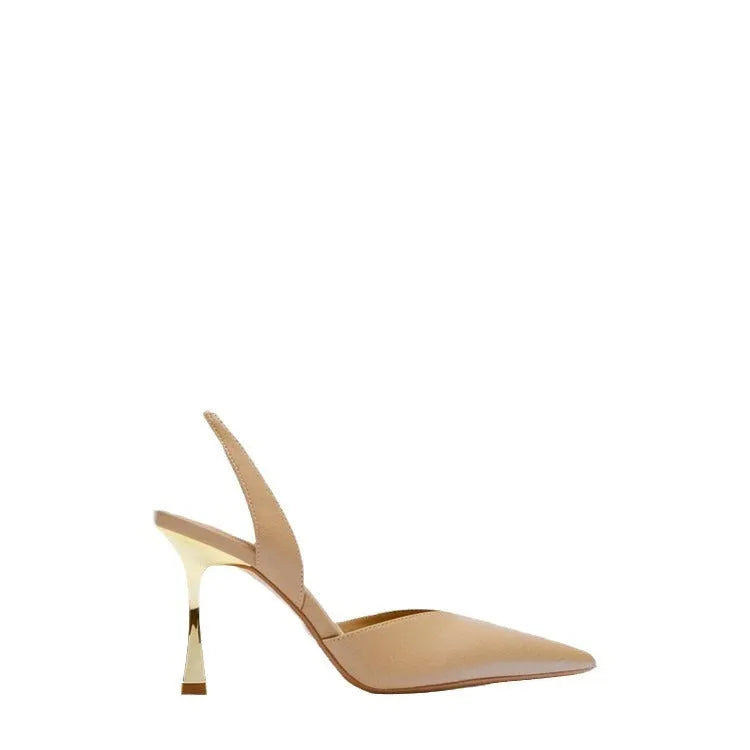 Patent leather pointed toe high heels in nude apricot colour with shallow mouth design