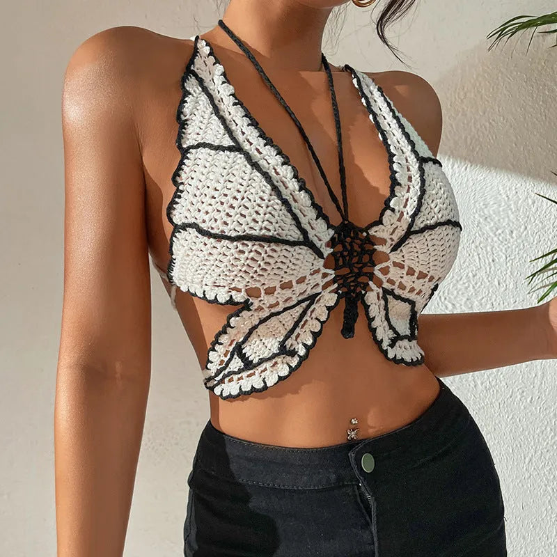 Black and white classic two-piece bikini swimsuit for women on a hanger.