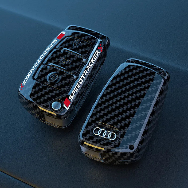 Carbon fibre style car key cover with mirrored finish in carbon pattern and white colour options