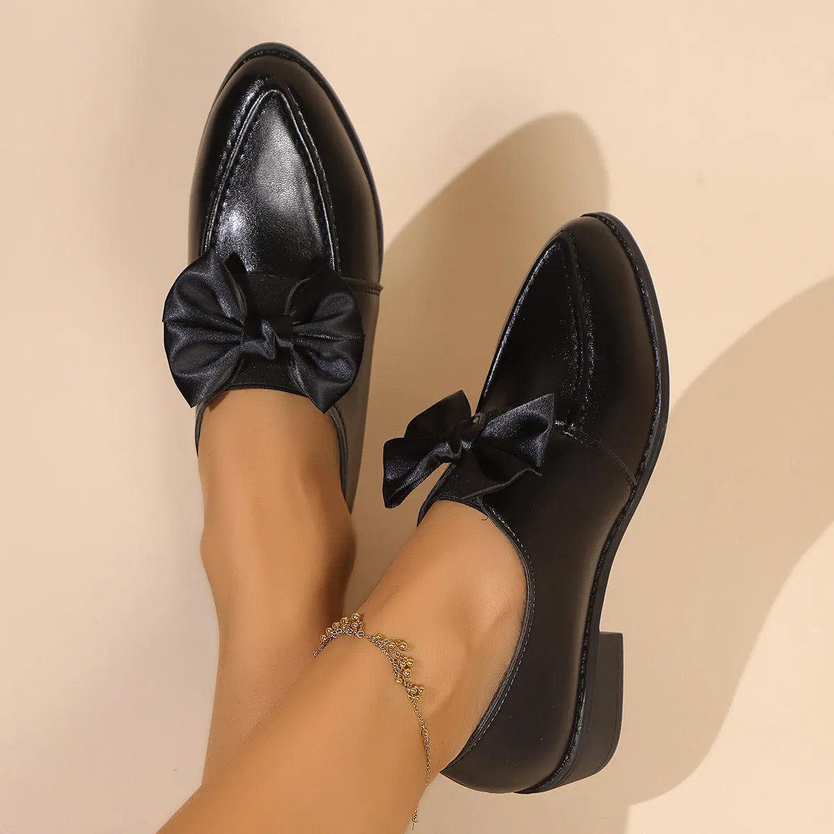 Women's British-style flat shoes with bow detail on PU upper and rubber sole