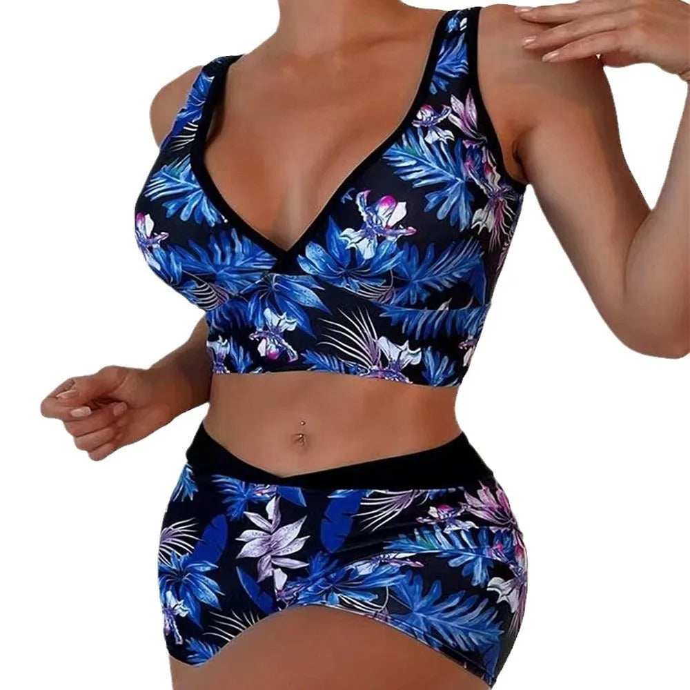Women's two-piece printed swimsuit set showing sleeveless top and briefs-style bottom in one of seven colour patterns