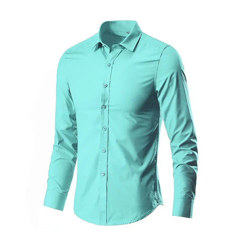 Man wearing a simple long-sleeve linen shirt in a loose fit, available in multiple colours and sizes.