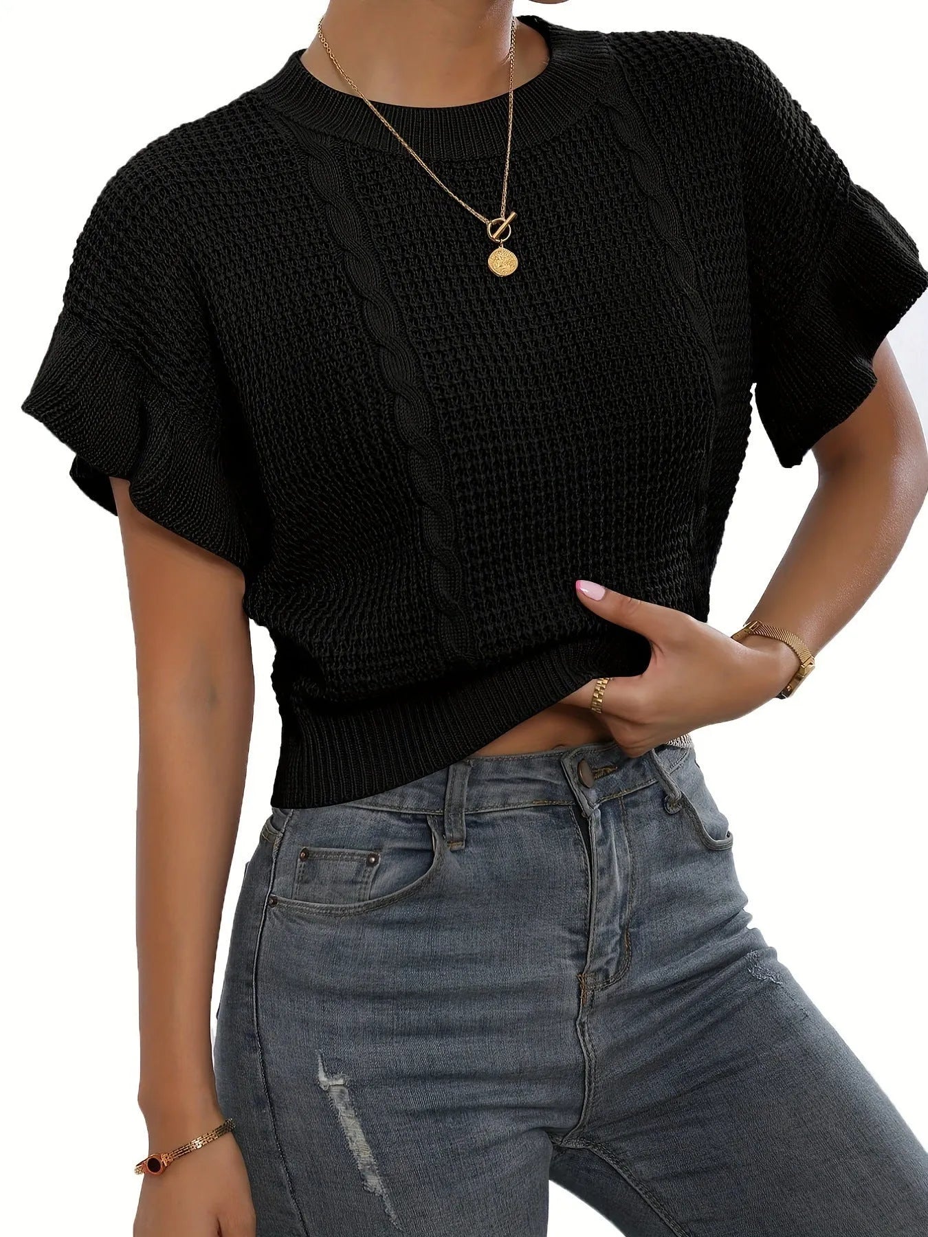 Loose fit knitted pullover sweater with ruffled short sleeves and twisted string design detailing
