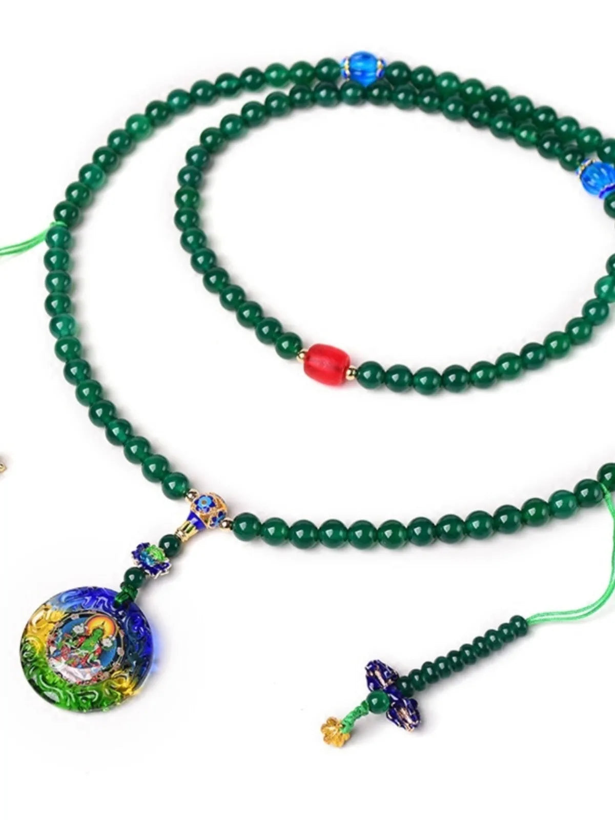 Handmade green agate bracelet with a detailed thangka pendant and multi-circle bead design.