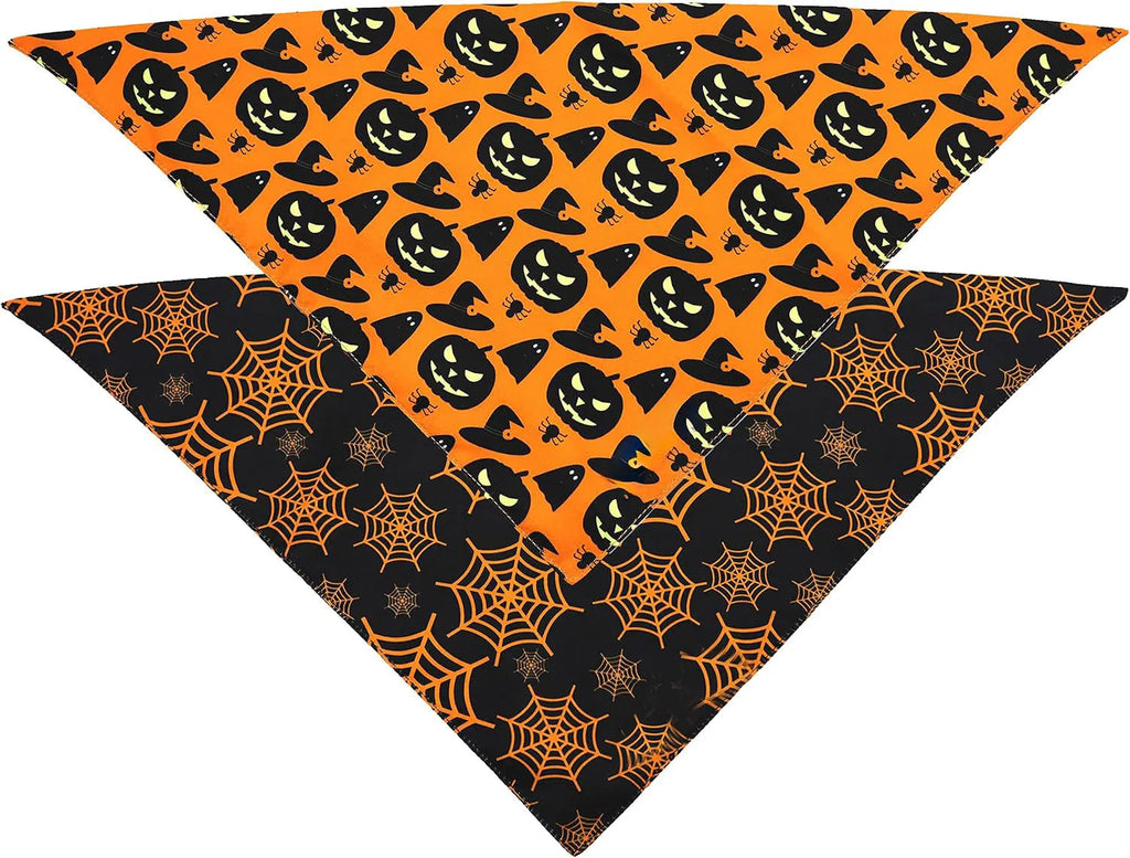 Black and orange reversible Halloween dog bandana with pumpkin and spider web patterns showing adjustable closure