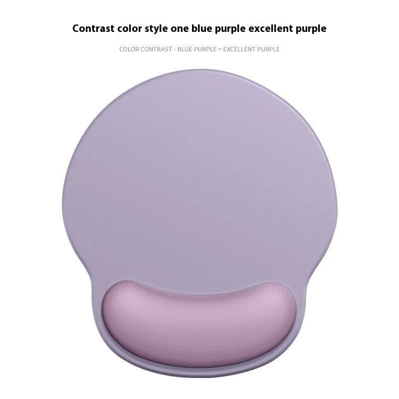 Silicone mouse mat with wrist rest in gradient colour pattern on desk