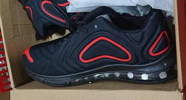 Men's black lace-up running sneakers with a thick sole and round toe design on a white background.