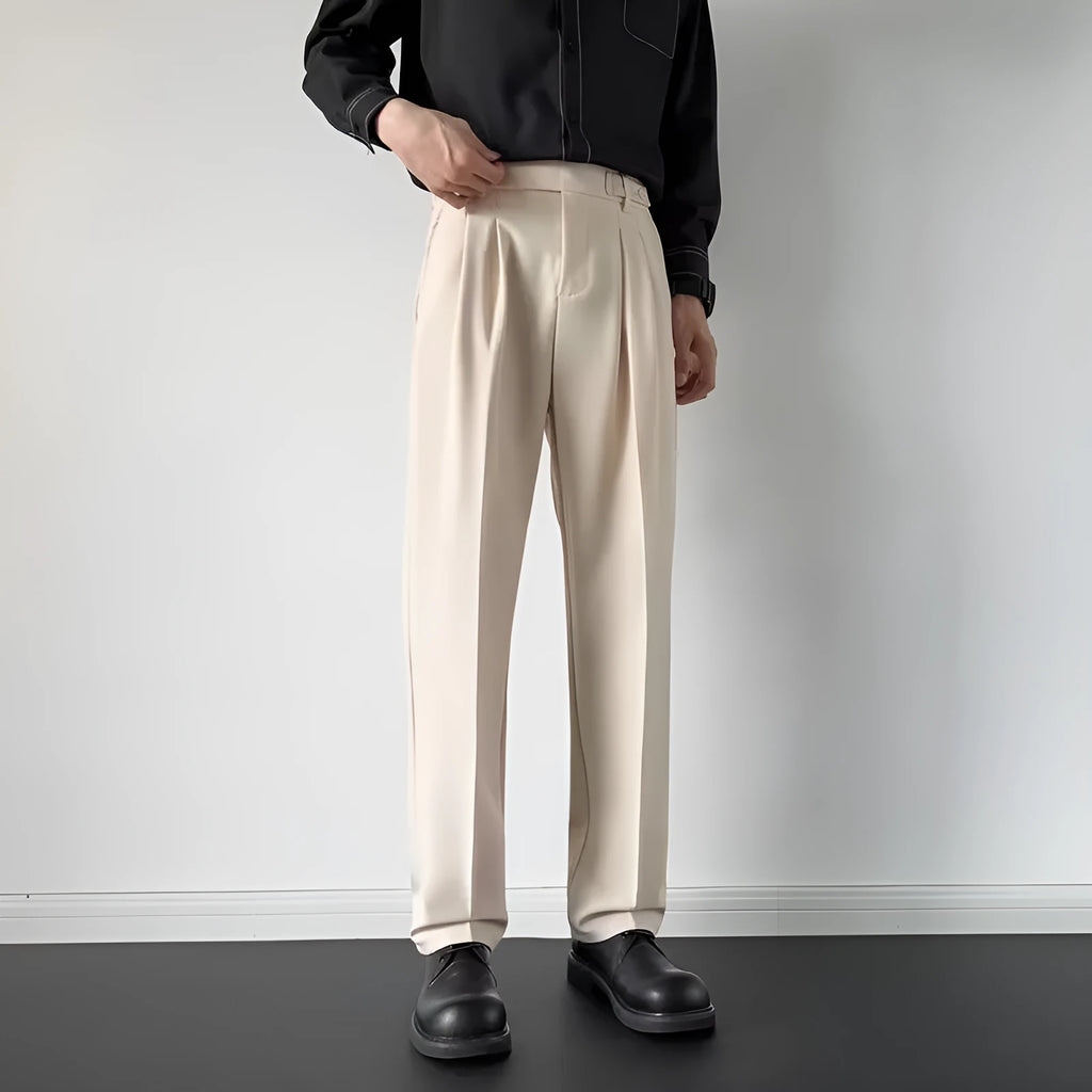 Men's apricot and black straight loose fit suit pants made from polyester fibre.