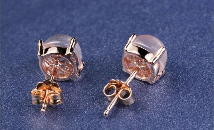 Women's rose gold drop stud earrings with synthetic quartz crystal inlay, Korean minimal style.