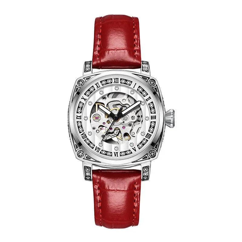 Mechanical watch with luminous hands and leather strap in choice of colours.