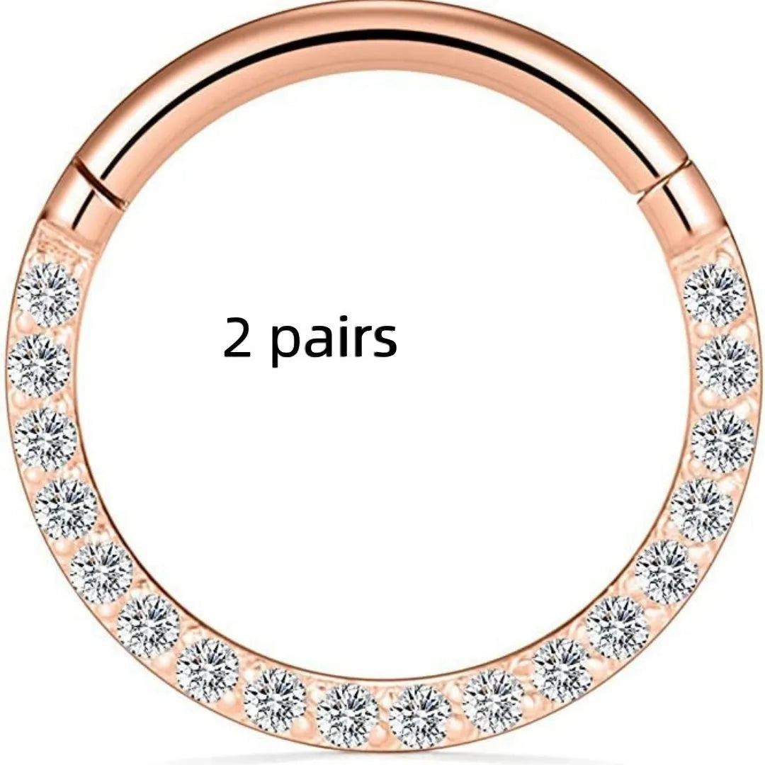 Stainless steel seamless nose ring with diamond detail showing multiple colour finishes and size options