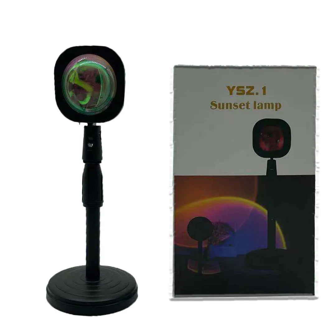 Rechargeable sunset projection lamp showing rainbow atmospheric lighting with USB power connector