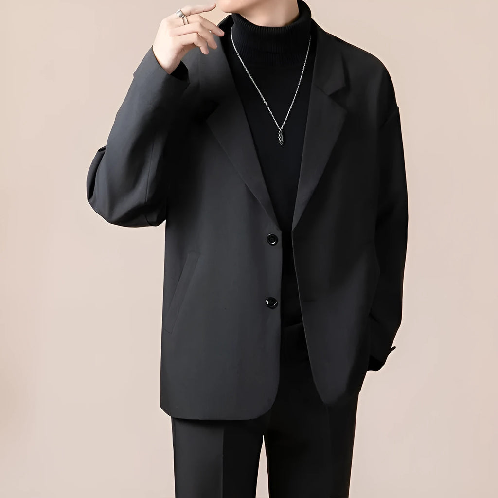 Man wearing a loose fit casual suit jacket in a light business style, available in apricot colour.