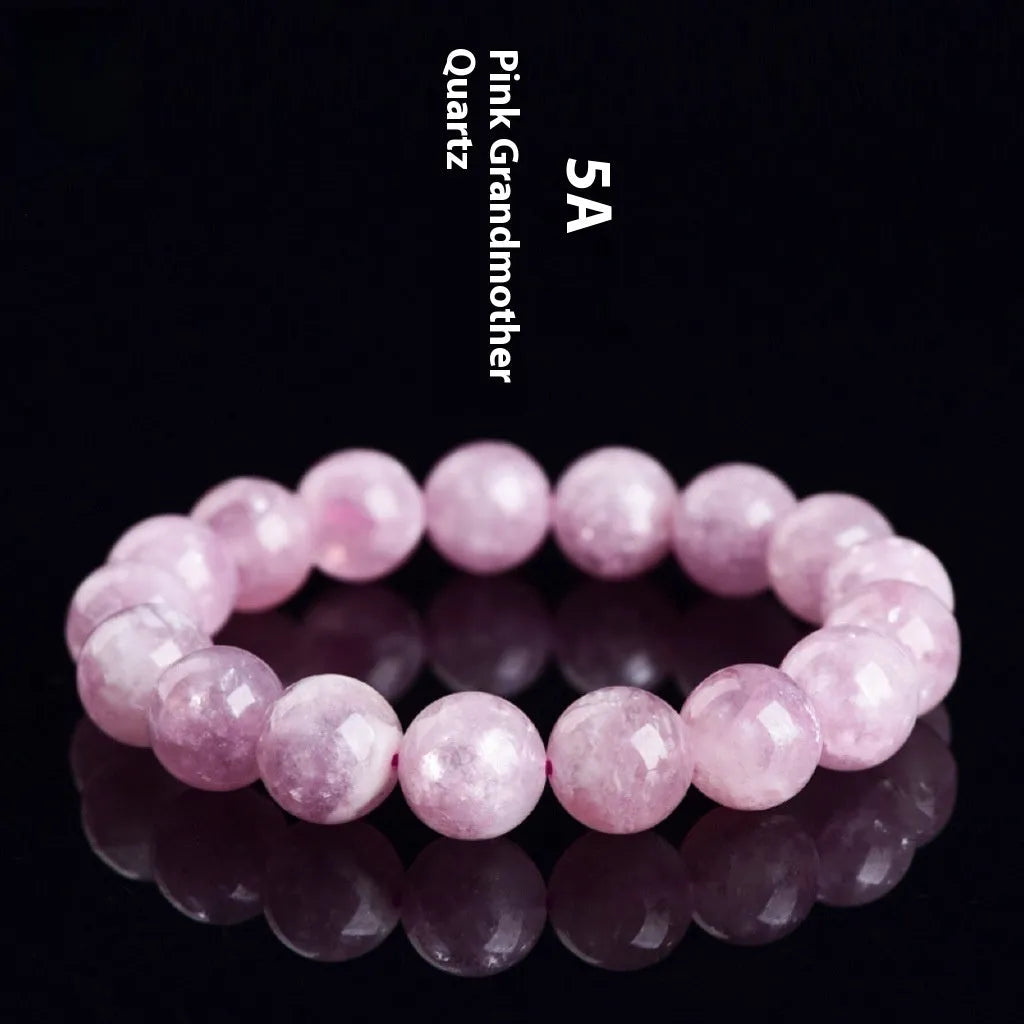 Purple grandmother crystal bracelet with polished geometric beads on wrist