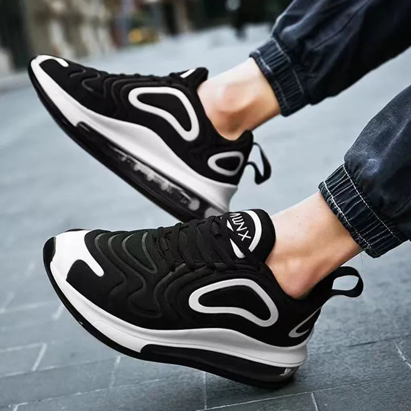 Men's black lace-up running sneakers with a thick sole and round toe design on a white background.