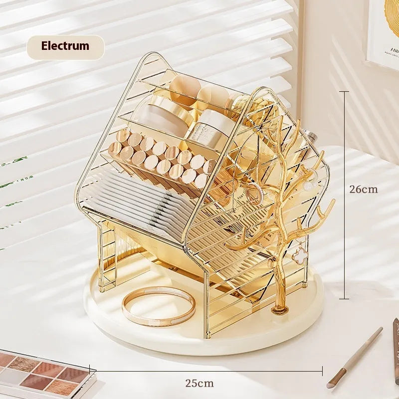 Clear and amber gold rotating cosmetics storage box organiser on a table.