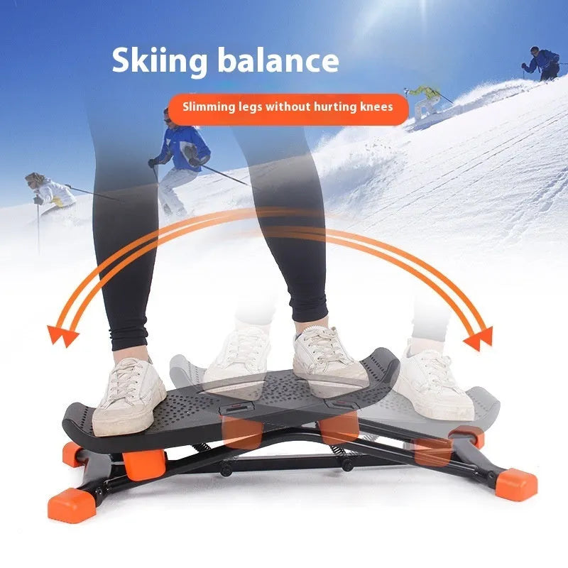 Black mini fitness skiing machine for home indoor exercise with elastic hand straps.