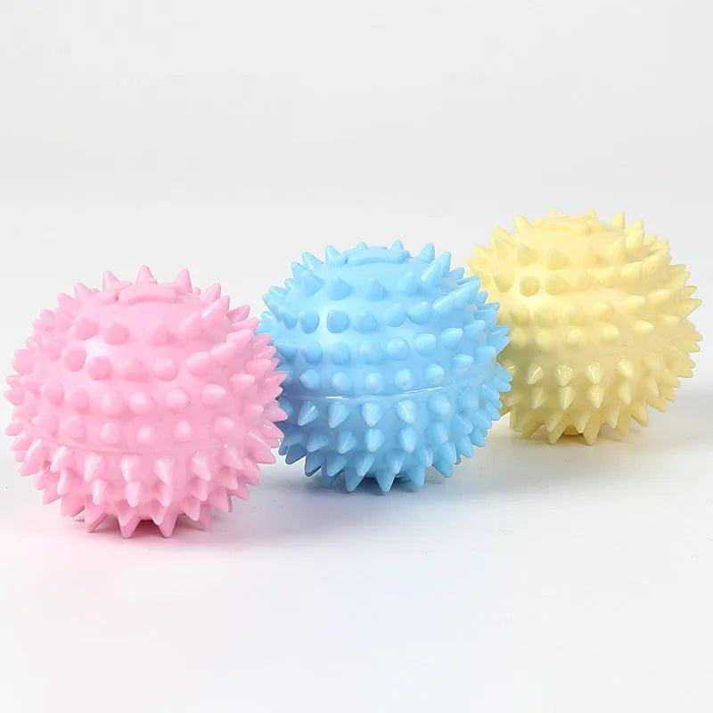 Blue TPR dog chewing toy footprint ball for tooth cleaning, 6cm diameter.