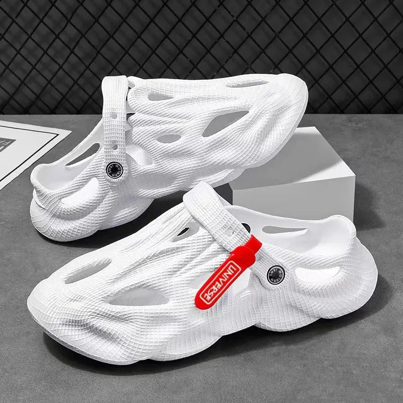 Men's grey EVA slippers with closed toe and breathable hole design on foot