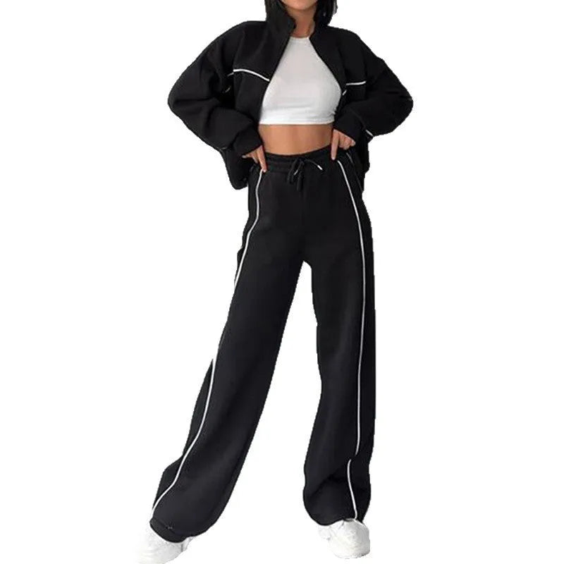Casual two-piece suit set with a grey hoodie and striped lace-up trousers on a hanger