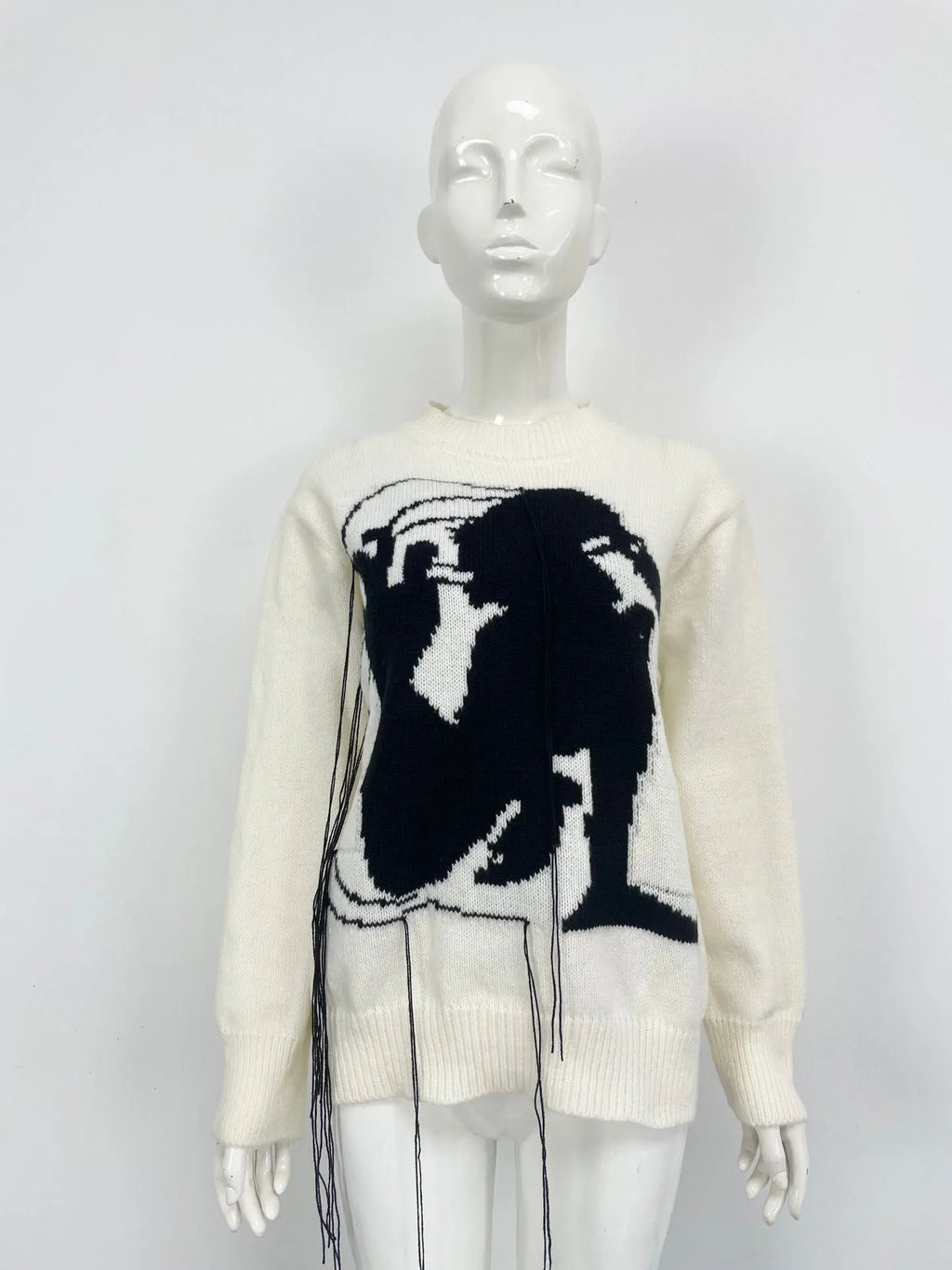 Grey alpaca wool women's sweater with tassel detail and abstract pattern