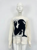 Grey alpaca wool women's sweater with tassel detail and abstract pattern