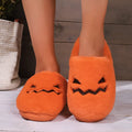 Orange Halloween pumpkin slippers with coral velvet upper and plush lining