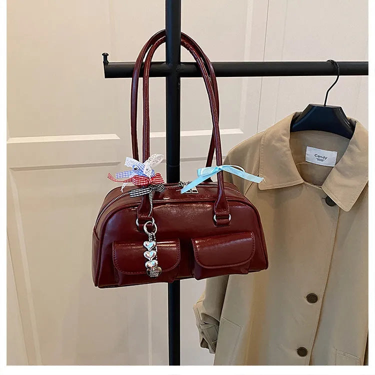Retro pillow-shaped women's handbag in PU leather with double shoulder strap