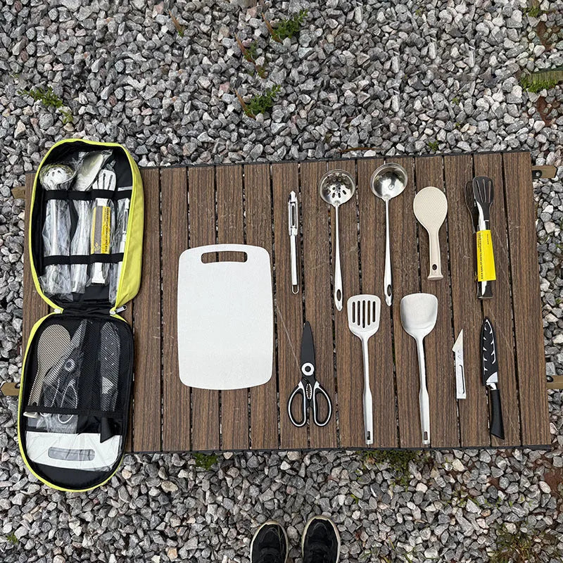 12-piece stainless steel picnic kitchenware set inside a khaki portable storage bag.