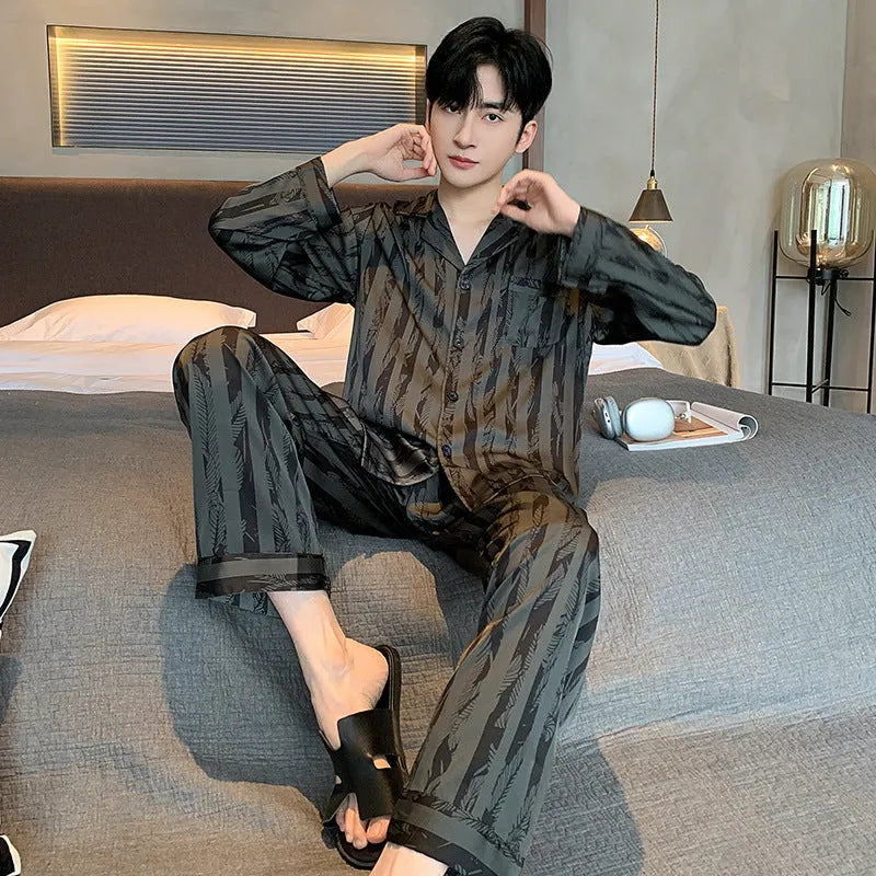 Black striped ice silk men's pajama set with long sleeve V-neck top and thin trousers.