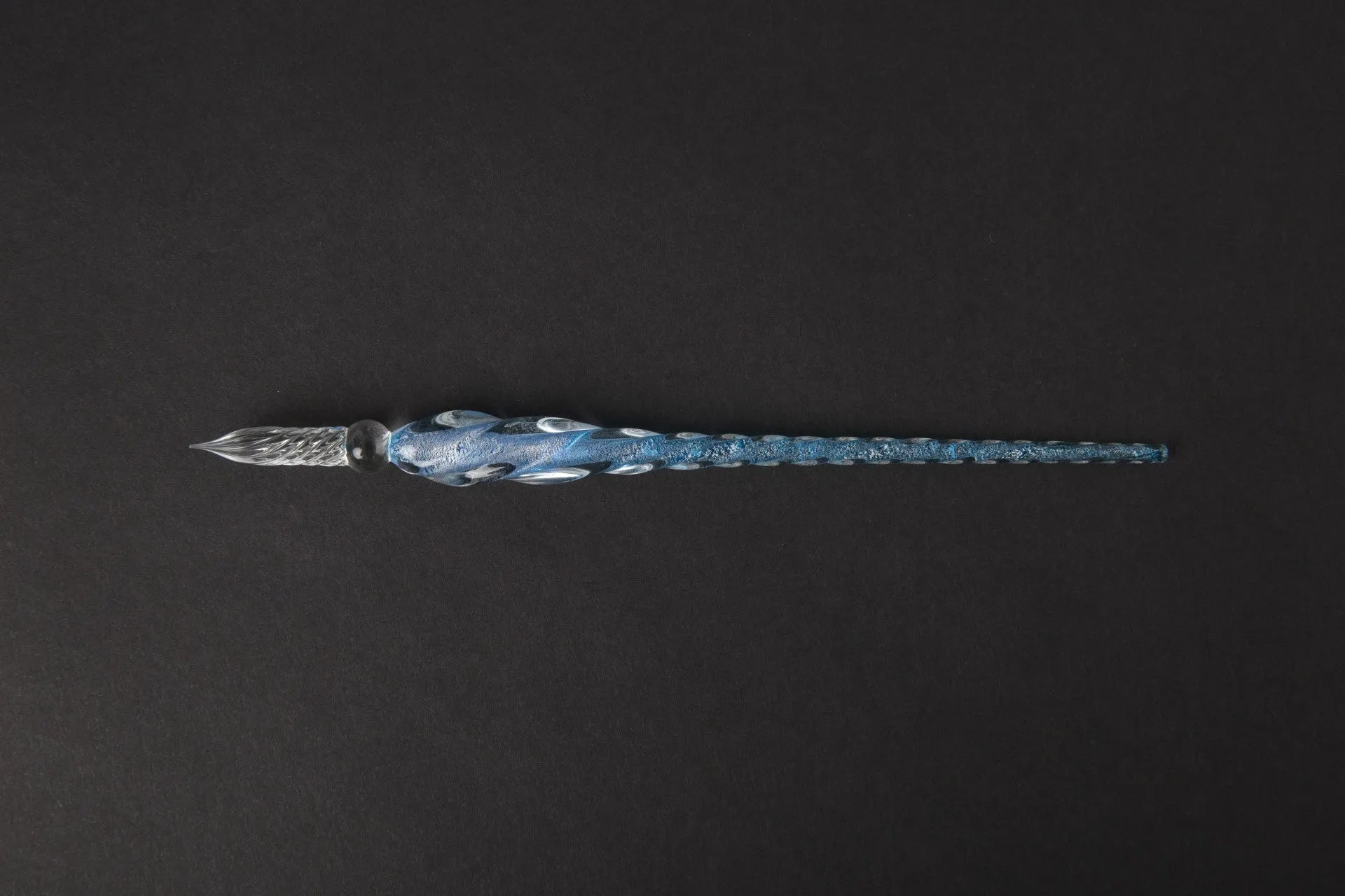 Transparent coloured glass crystal pen with water art ink in gift box, shown in multiple colour options.