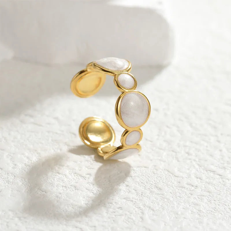 Adjustable geometric stainless steel ring with electroplated surface design