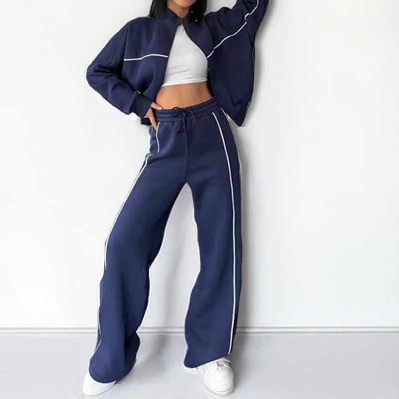 Casual two-piece suit set with a grey hoodie and striped lace-up trousers on a hanger