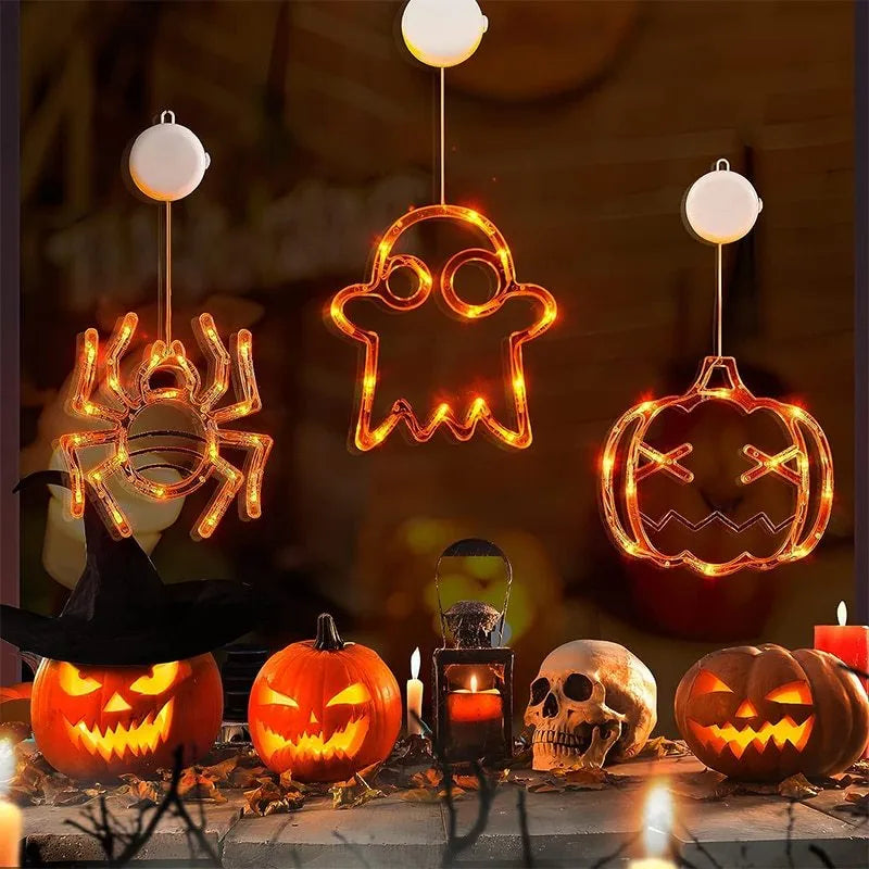 Set of seven Halloween-themed LED hanging lights with suction cups for window display