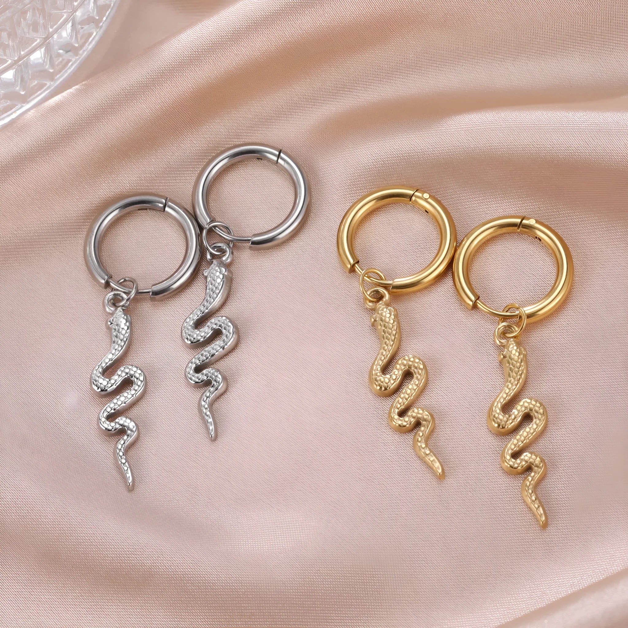 Stainless steel snake vintage earrings with gold plating and ear clip design