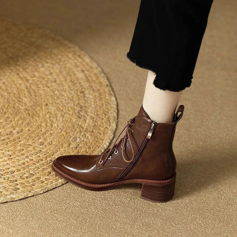 Women's black pointed-toe ankle boots with 5.5cm heel and 13cm shaft