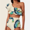 White women's one-shoulder swimsuit with lotus leaf detail and split design