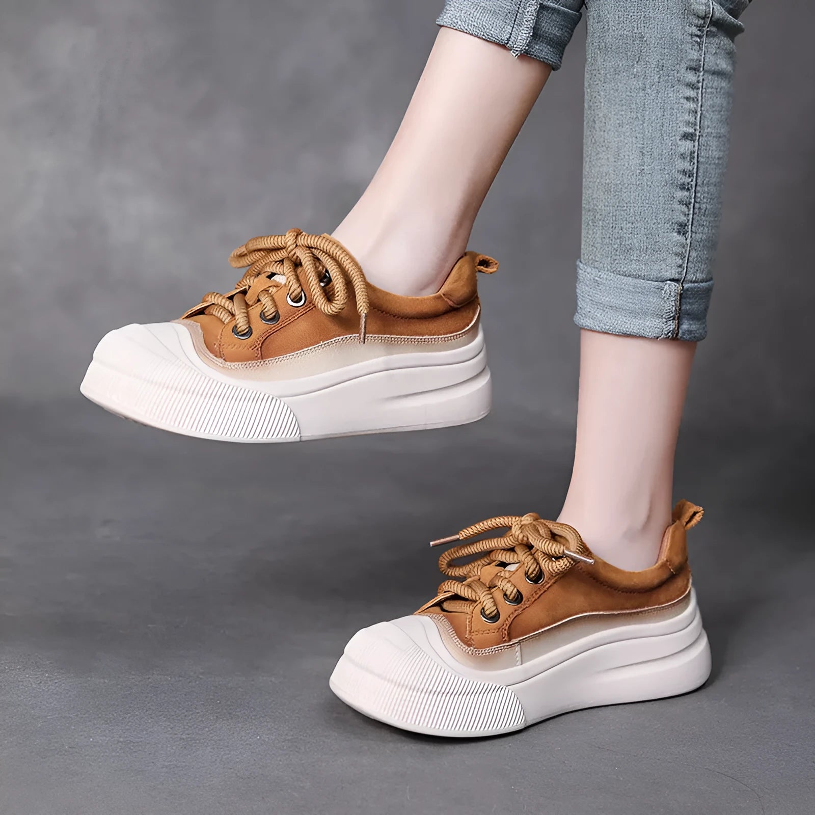 Women's yellow leather lace-up casual shoes with round toe and rubber sole.