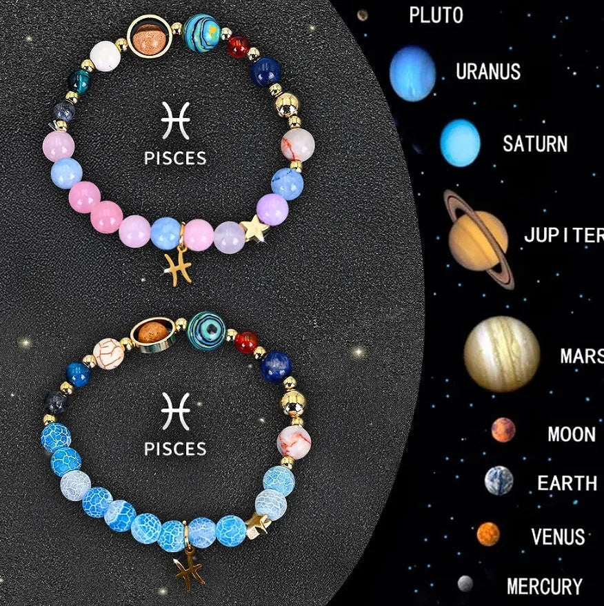 Set of two natural stone beaded bracelets with zodiac sign charms on a white background.
