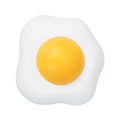 Soft plush catnip ball toy with suction cup mounted on a wall, shown in fried egg and poached egg shapes.