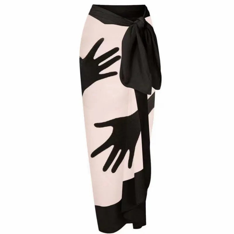Women's one-piece bikini swimsuit with a gauze skirt cover-up.