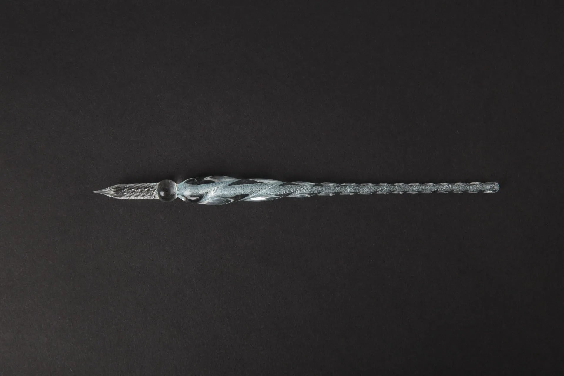 Transparent coloured glass crystal pen with water art ink in gift box, shown in multiple colour options.
