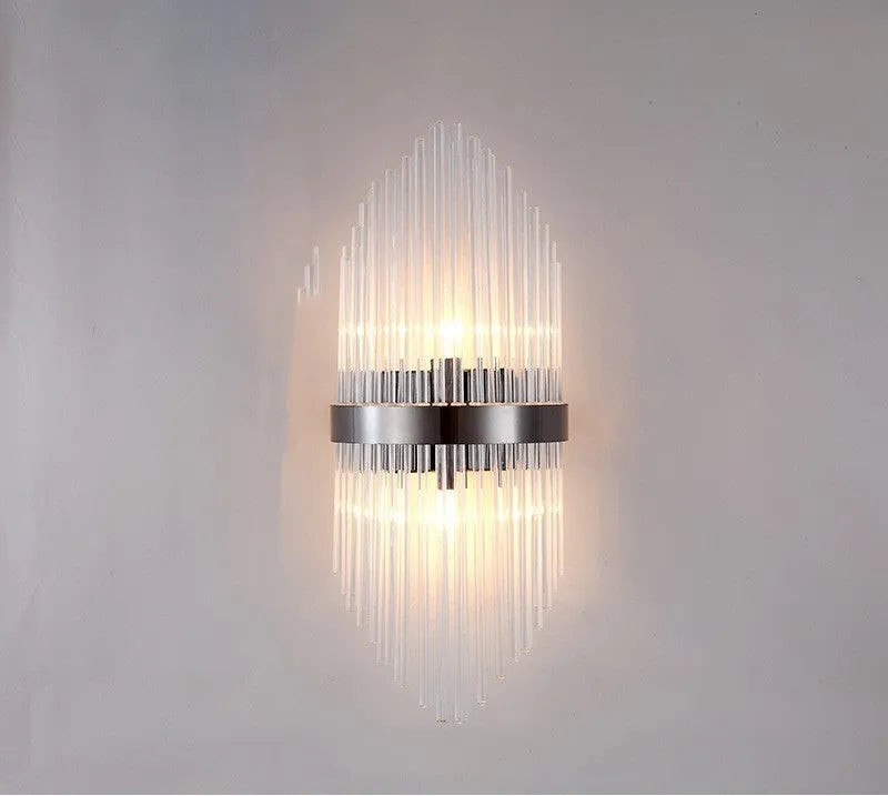 Modern crystal wall lamp with petal design in titanium gold finish