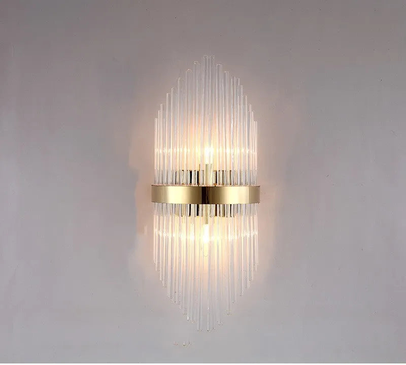 Modern crystal wall lamp with petal design in titanium gold finish