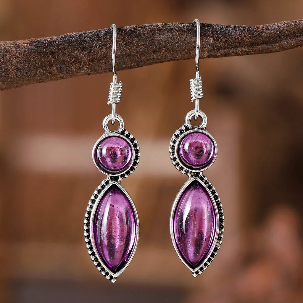 Black and purple geometric pendant earrings with round elements in vintage bohemian style