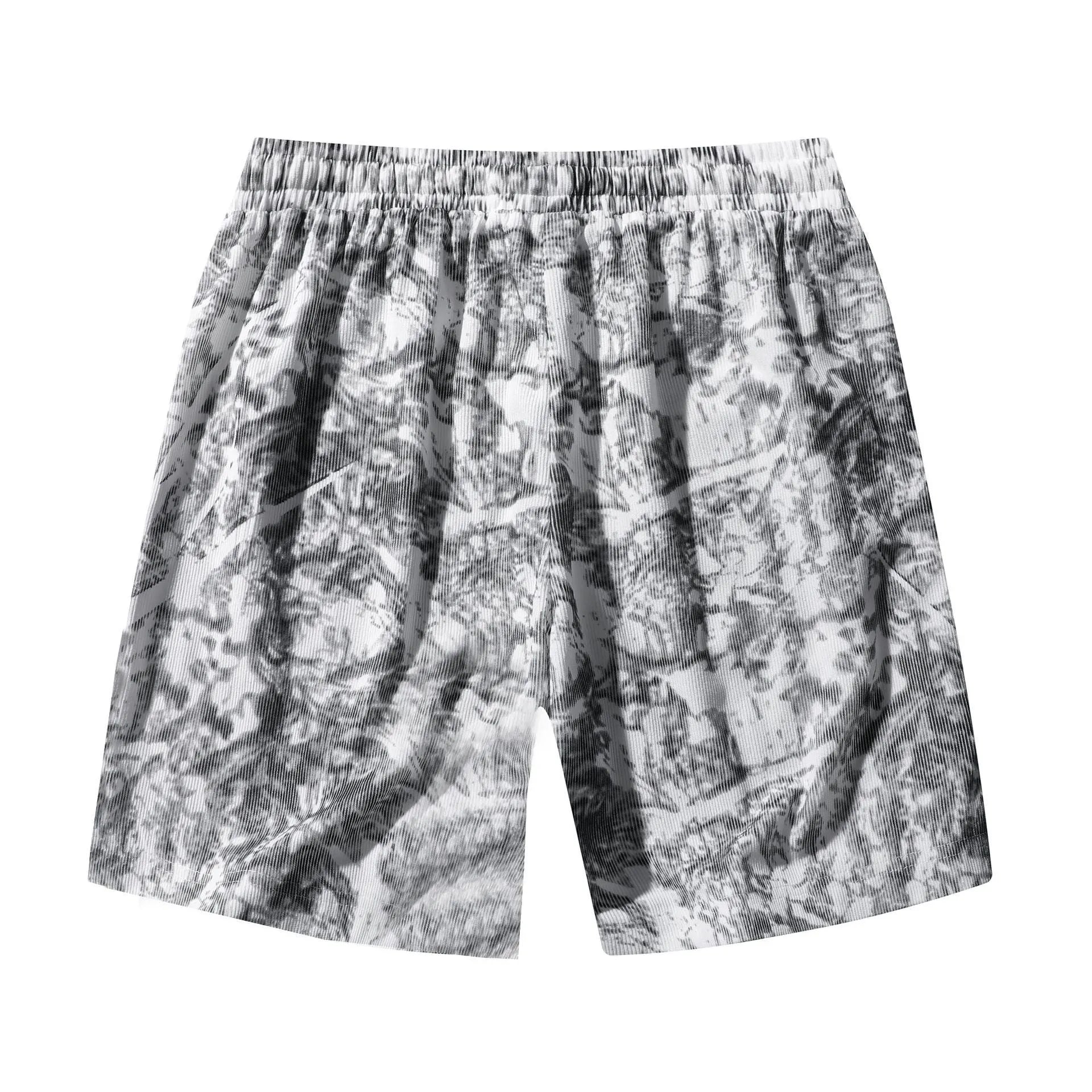 Men's straight-leg corduroy camouflage shorts in black, shown on a model.