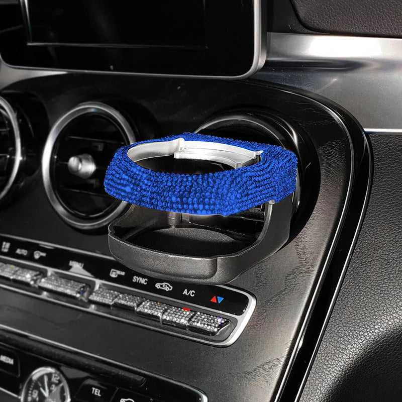 Rhinestone-decorated car cup holder bracket mounted on vehicle air vent in multiple colour options