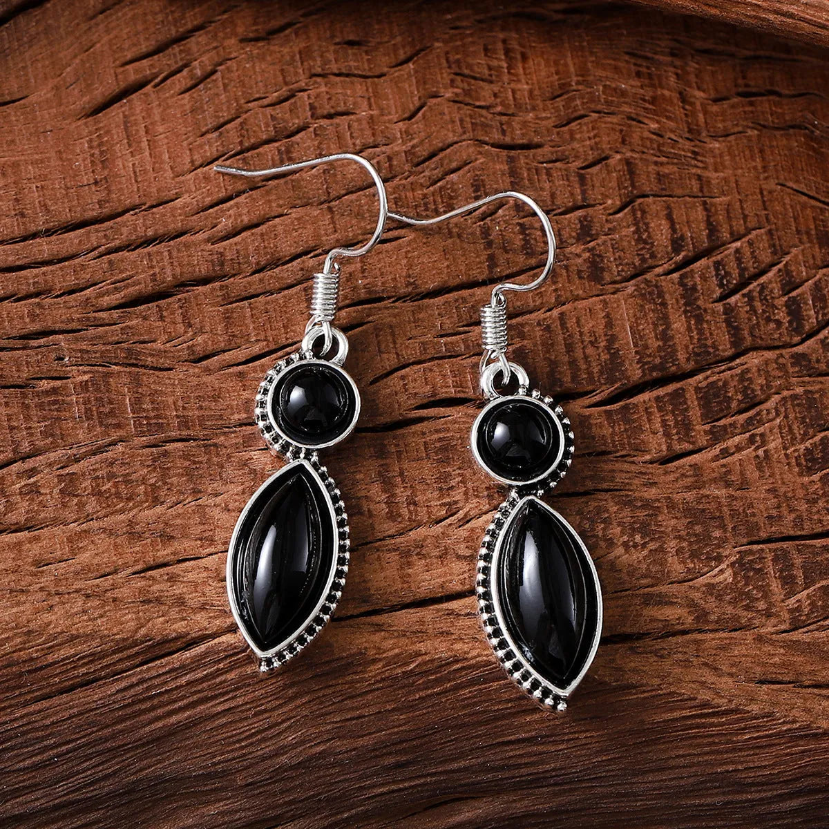 Black and purple geometric pendant earrings with round elements in vintage bohemian style