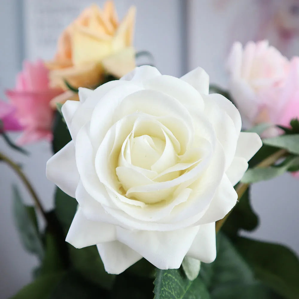 Silk artificial rose bouquet with 8.5cm flower heads in red, orange, white or purple fringe pink colours